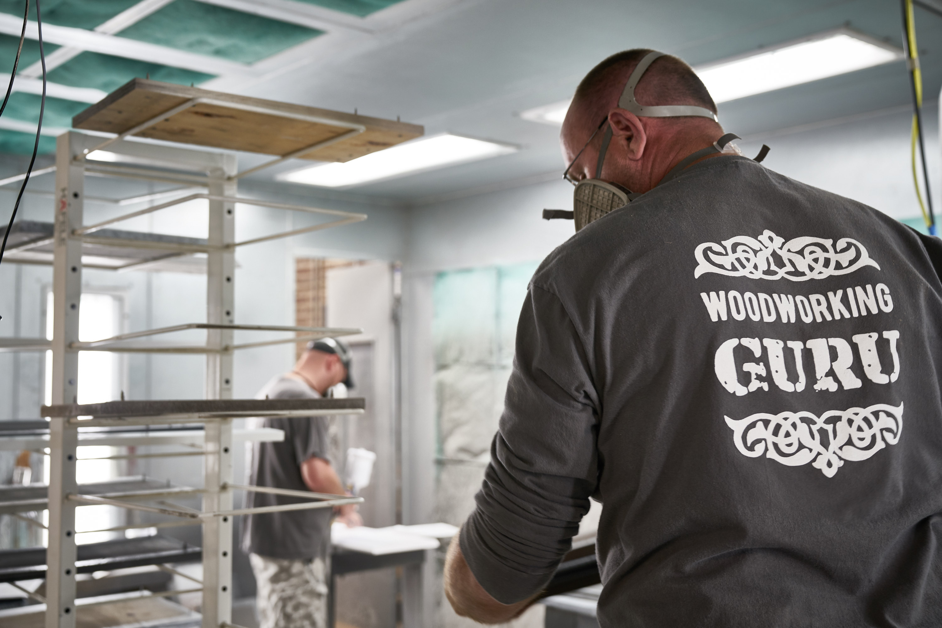 Hand-applied finish in the spray booth